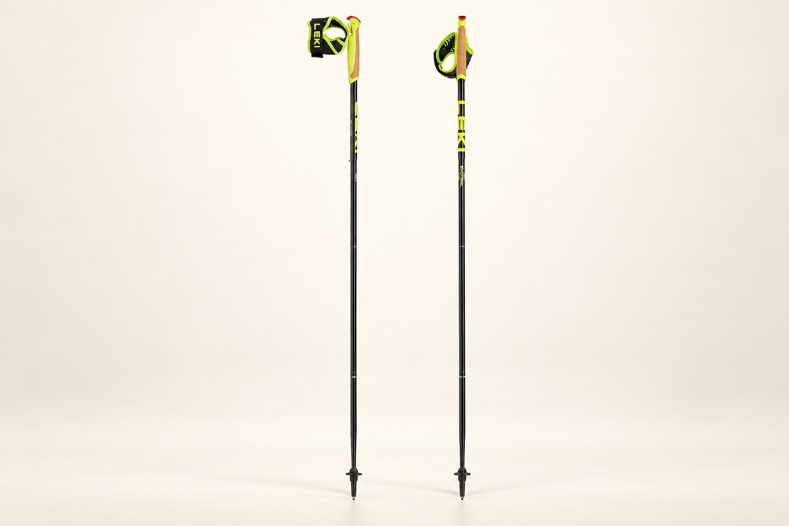 Product illustration of a pair of deployed LEKI Evotrail FX.One TA poles with lime grip housings